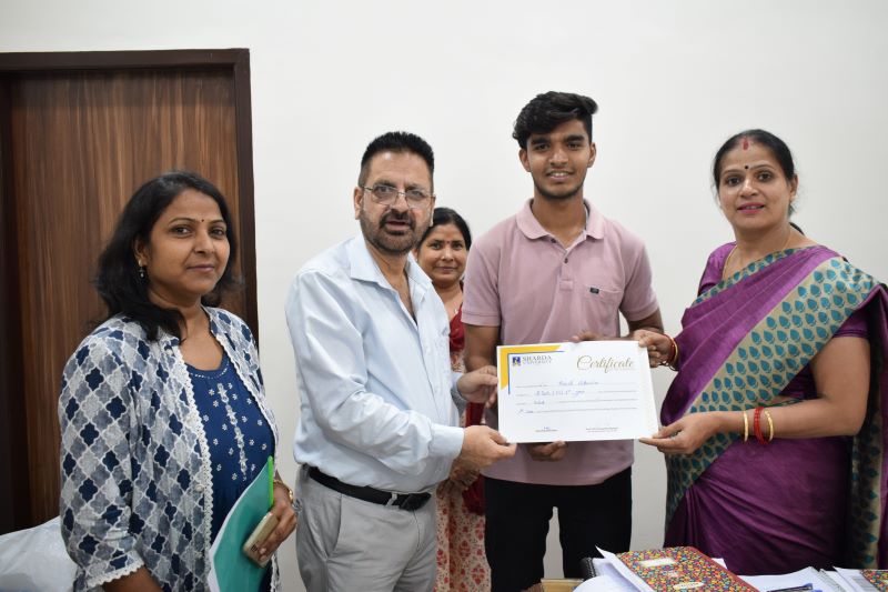 Certificate distribution of Debate Competition 01 - Sharda University Agra